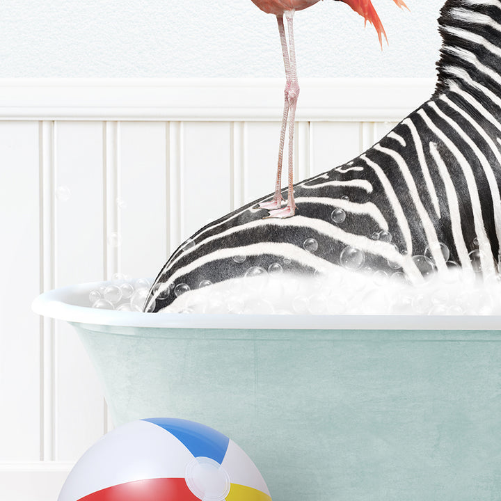 a zebra in a bathtub with a beach ball