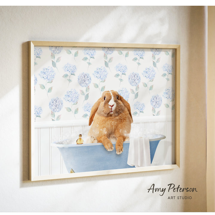 A picture of a brown rabbit sitting in a blue bathtub, surrounded by a floral pattern on the wall behind it.