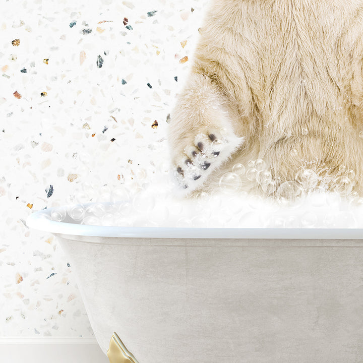 a polar bear sitting in a bath tub