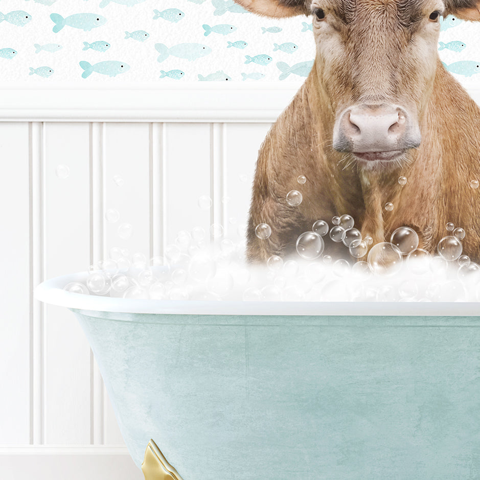 a cow sitting in a bathtub filled with bubbles