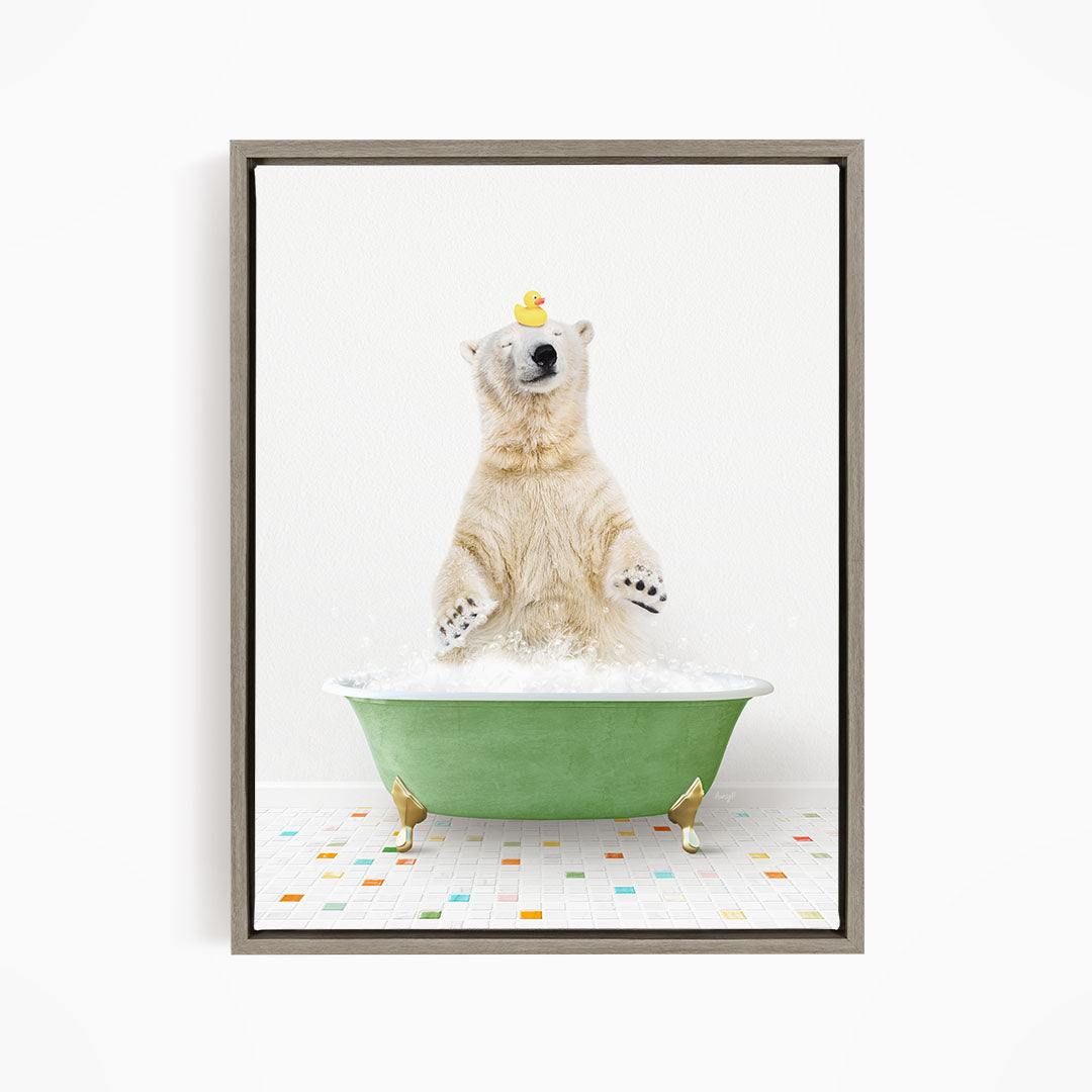 A polar bear is sitting in a green bathtub filled with bubbles, with a rubber duck perched on its head.
