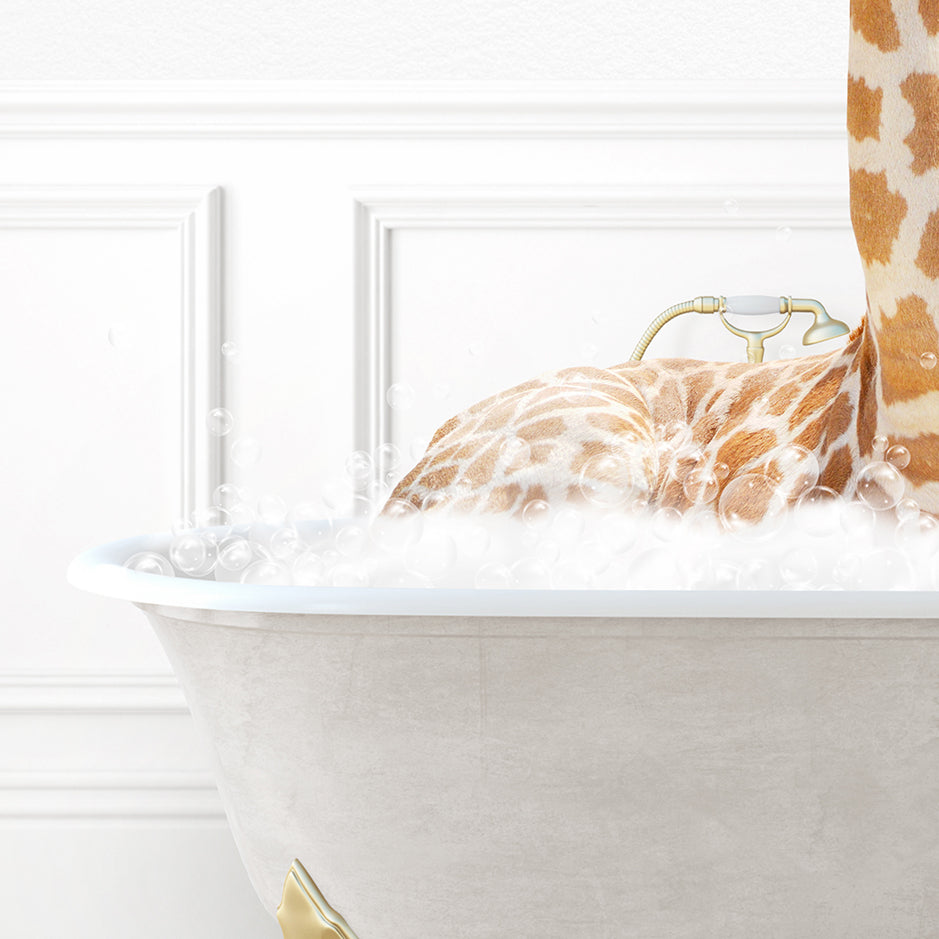 a giraffe laying down in a bath tub