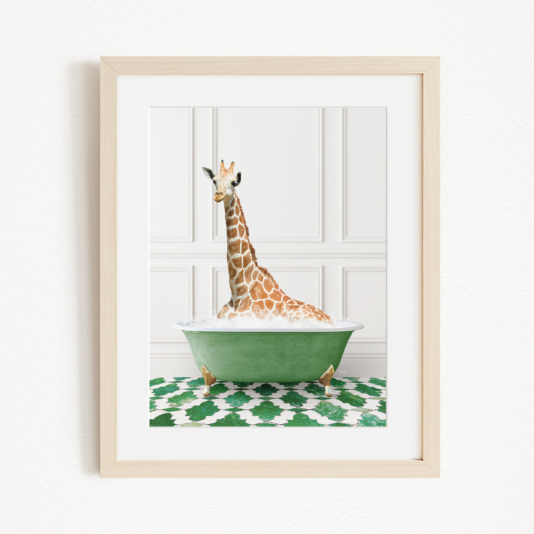 A giraffe sitting in a green bathtub filled with bubbles, with a green and white patterned rug on the floor.