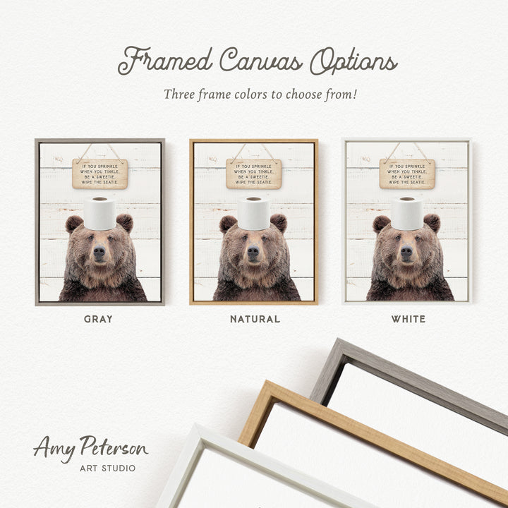 The image is a framed canvas with three different color options for the frame, including gray, natural, and white. The canvas features a picture of a bear with a sign that reads "If you sprinkle when you sneeze, when you cough, when you sneeze, wipe your face with a toilet paper roll".