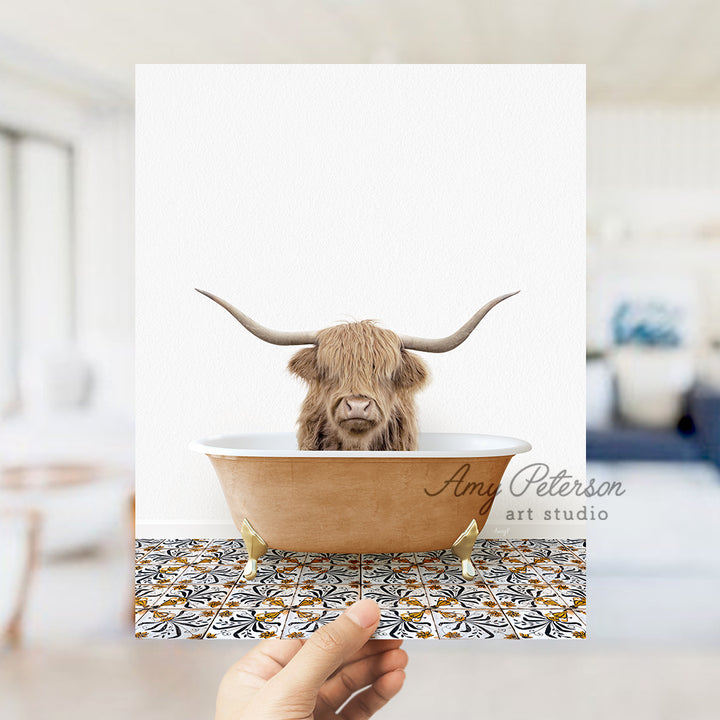 a person holding a card with a picture of a bull in a bathtub