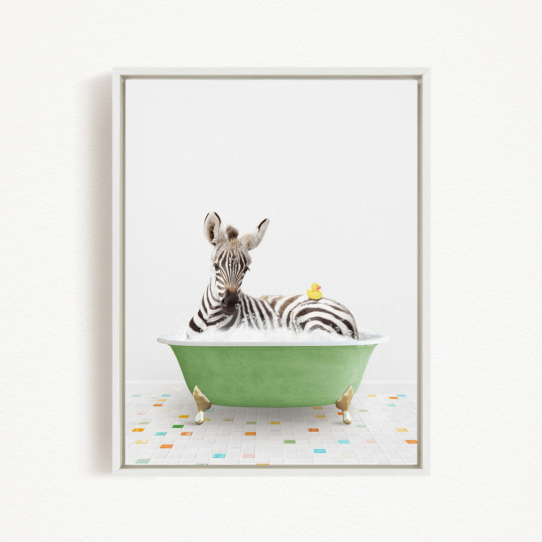 A zebra is sitting in a green bathtub, with a yellow rubber duck resting on its back.