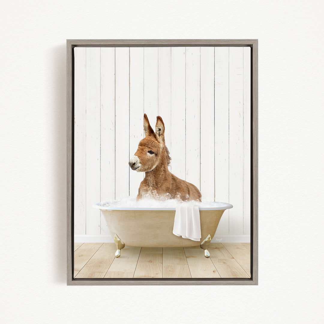 A donkey is sitting in a bathtub filled with water, creating a playful and whimsical scene.