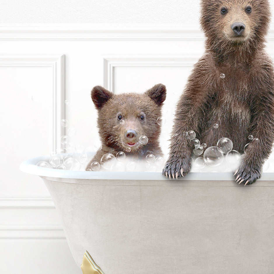 two brown bears in a bathtub with bubbles