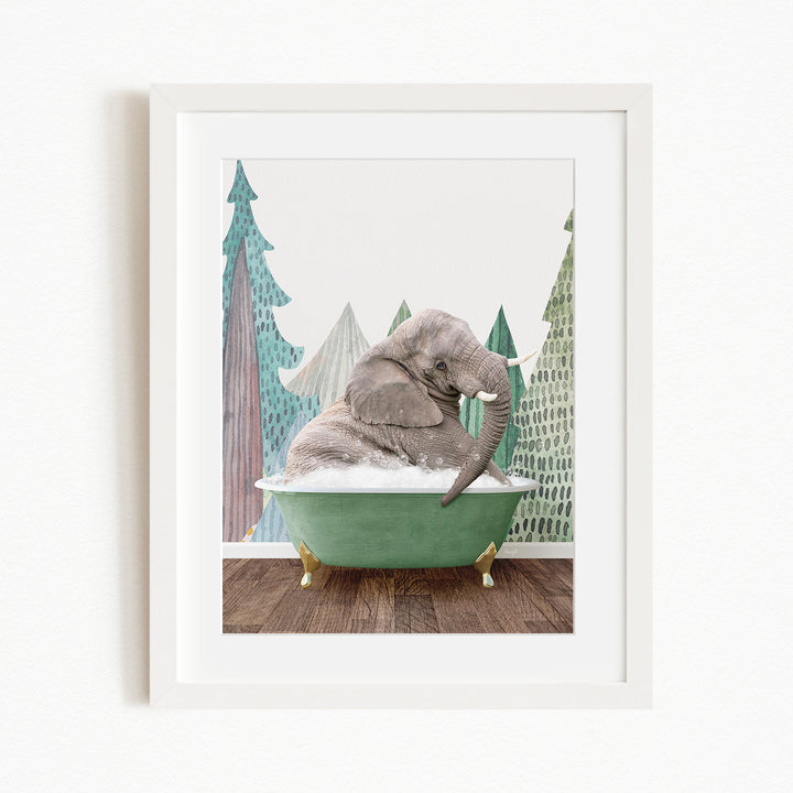 A gray elephant is sitting in a green bathtub, surrounded by a forest-like background with trees and a snowy landscape.