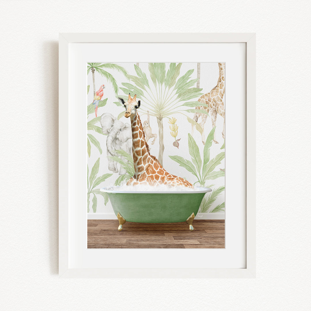 A giraffe is sitting in a green bathtub, surrounded by tropical foliage, in a framed artwork.