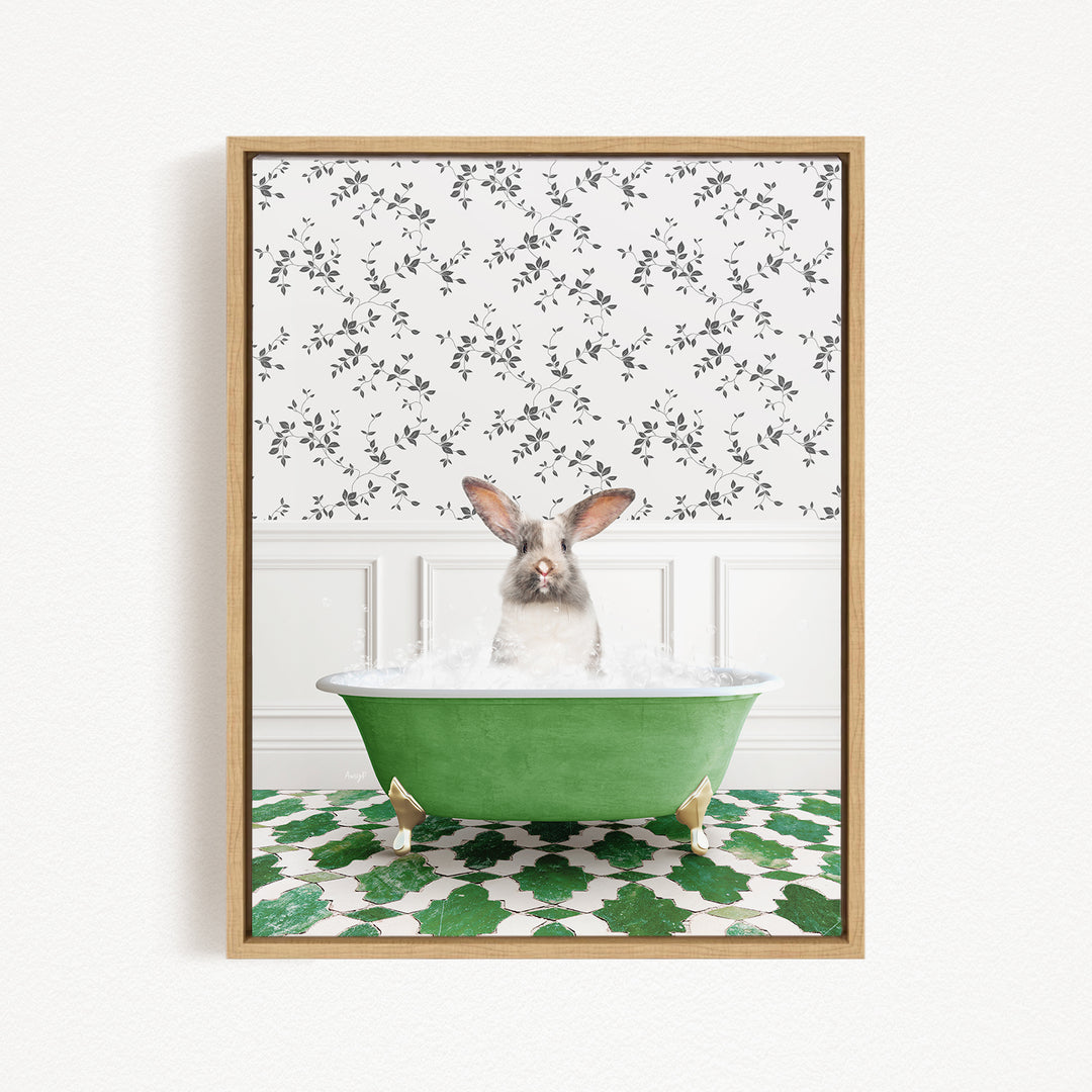 A fluffy white rabbit sits in a green bathtub filled with water, surrounded by a patterned green and white rug.