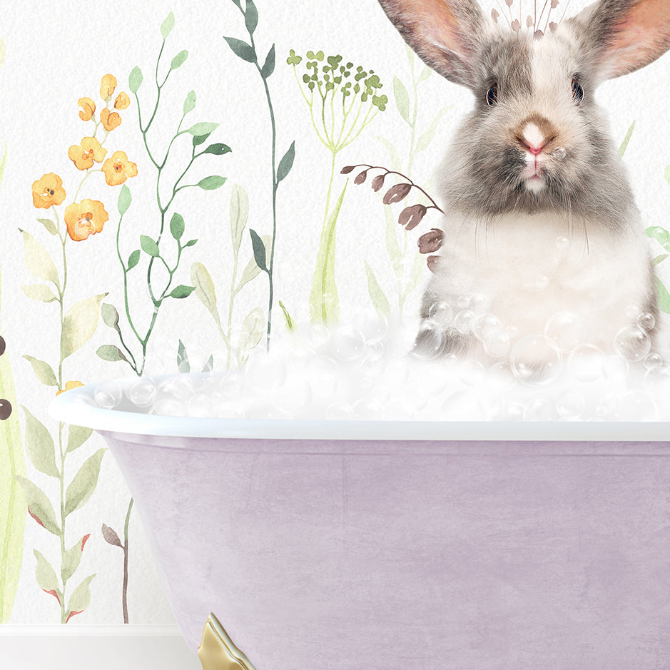 a rabbit is sitting in a bathtub with flowers on the wall