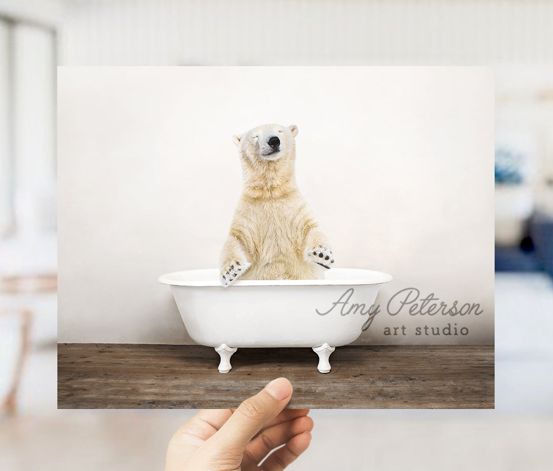 a polar bear sitting in a bath tub