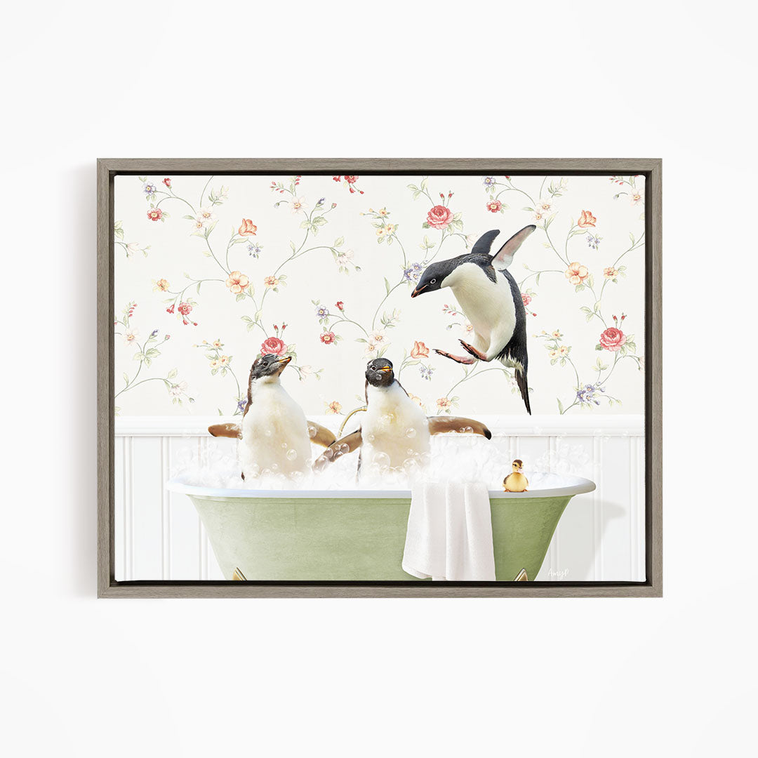 A framed image depicting three penguins sitting in a bathtub, with one penguin flying out of the tub.