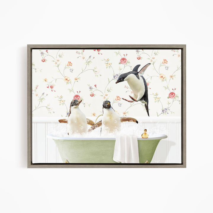 A framed image depicting three penguins sitting in a bathtub, with one penguin flying out of the tub.