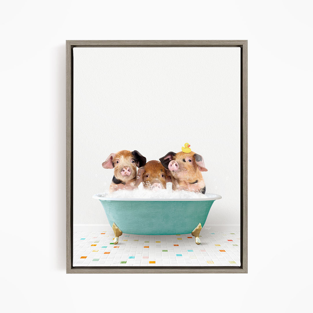 Three adorable pigs sitting in a green bathtub, with one of them wearing a yellow hat.