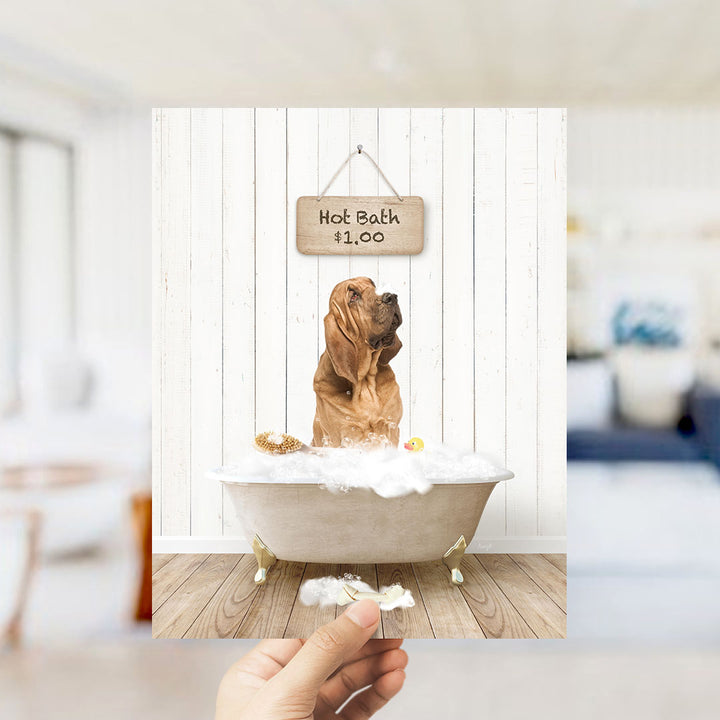 A brown dog sitting in a bathtub filled with bubbles, with a sign above the tub that says "Hot Bath $1.00".