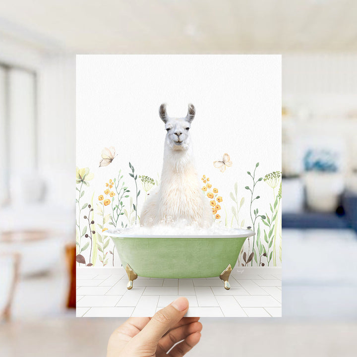 A white llama sitting in a green bathtub filled with bubbles, surrounded by flowers and butterflies.