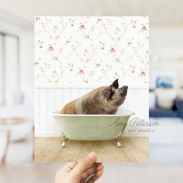 a hand holding up a card with a dog in a bathtub