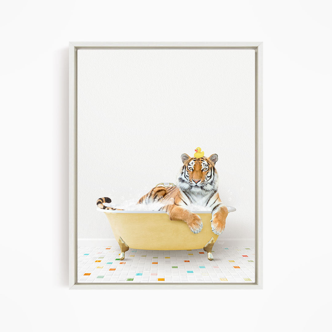 A tiger is sitting in a yellow bathtub, wearing a crown and surrounded by colorful tiles on the floor.