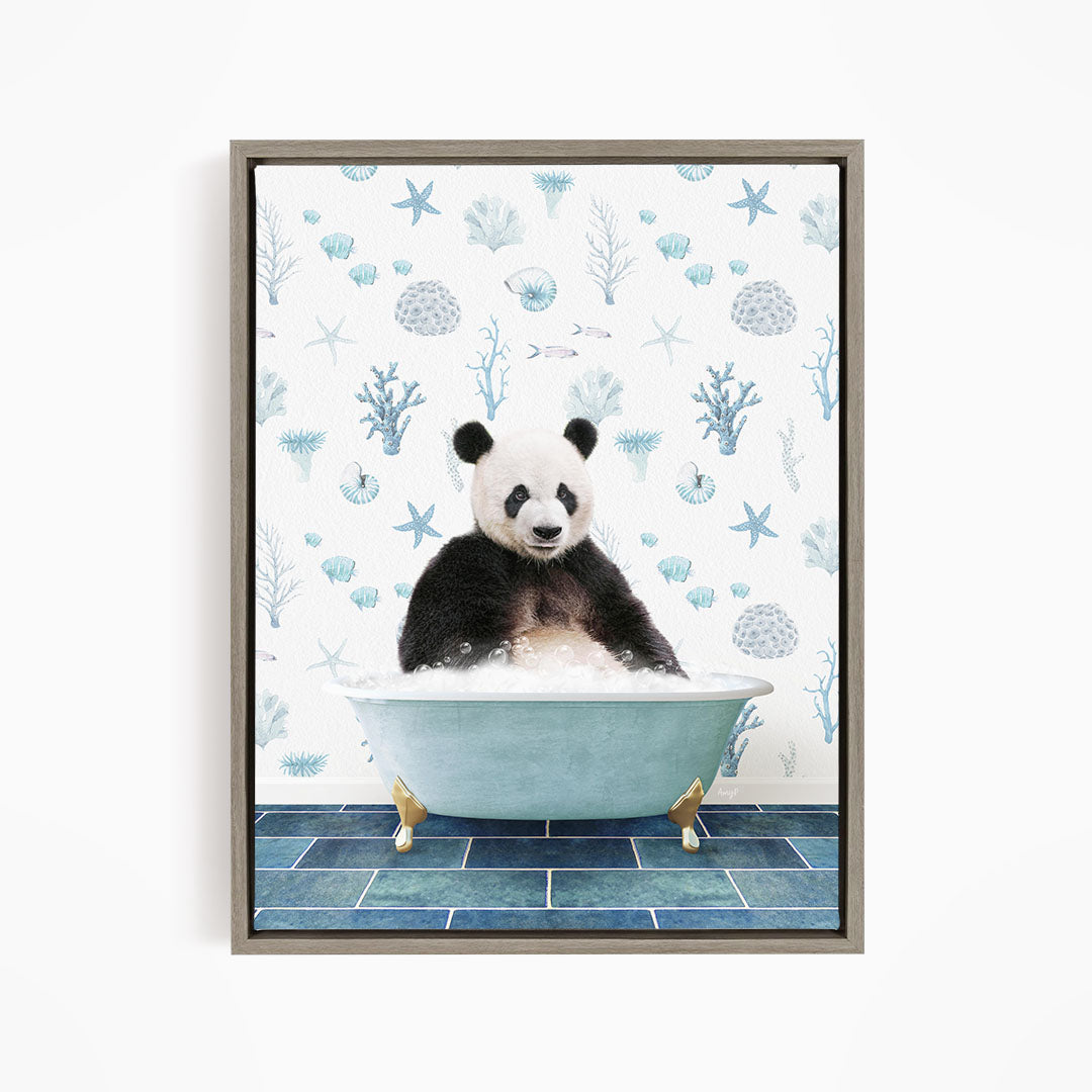 A panda bear sitting in a bathtub filled with bubbles, surrounded by a blue and white ocean-themed wallpaper.