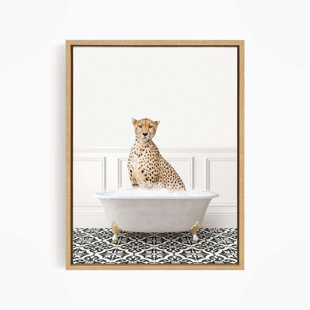 A cheetah sitting in a white bathtub filled with water, surrounded by a black and white patterned floor.