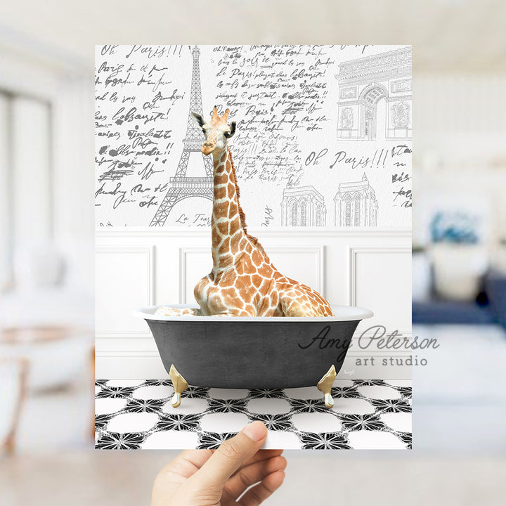 a giraffe sitting in a bathtub with writing on the wall behind it