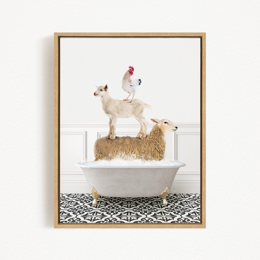 A framed image depicting a goat standing on top of a sheep in a bathtub, with a rooster perched on the sheep's back.