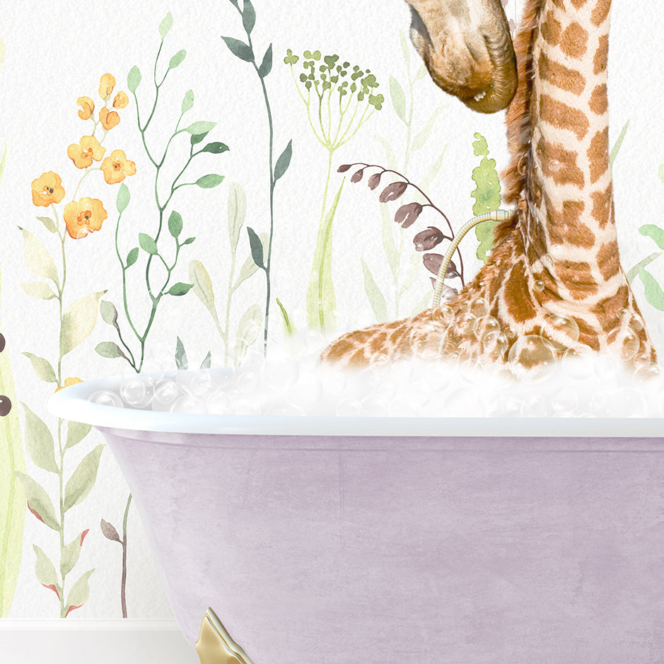 a baby giraffe in a bathtub with flowers on the wall