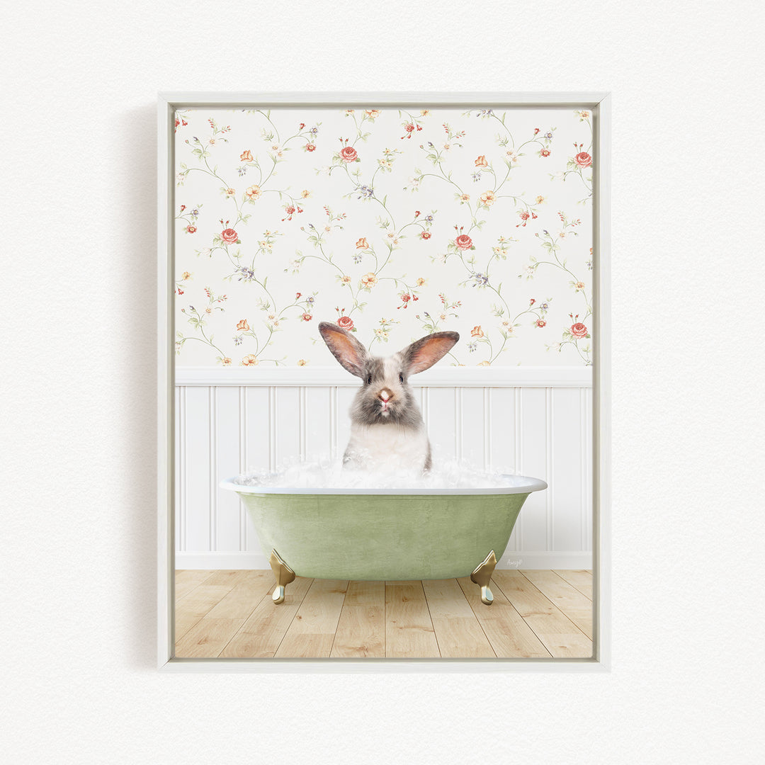 A white rabbit sitting in a green bathtub filled with water, with a floral wallpaper in the background.