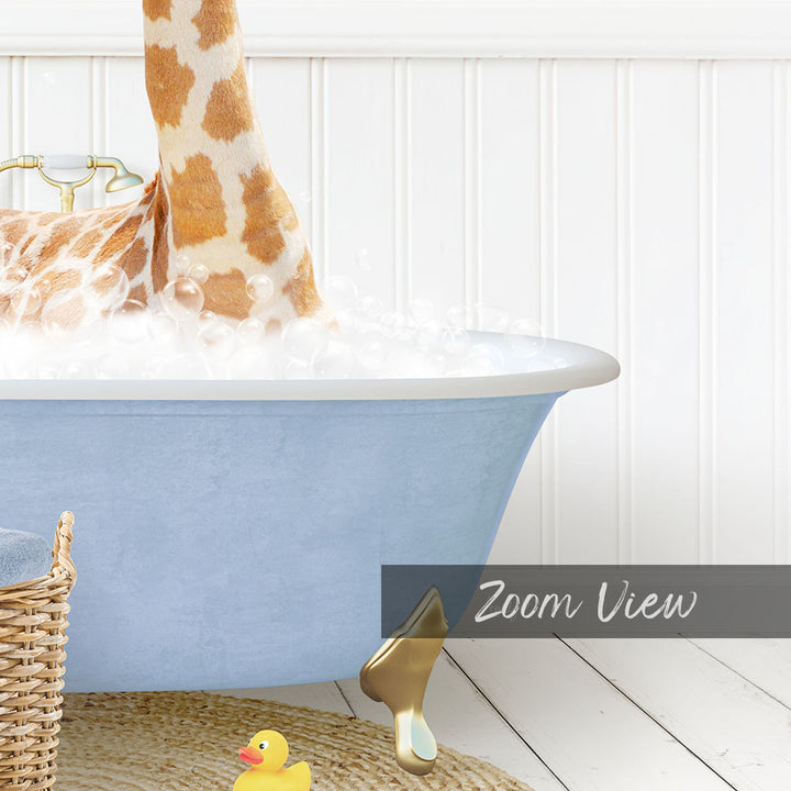A giraffe standing in a blue bathtub filled with bubbles, with a yellow rubber duck nearby.