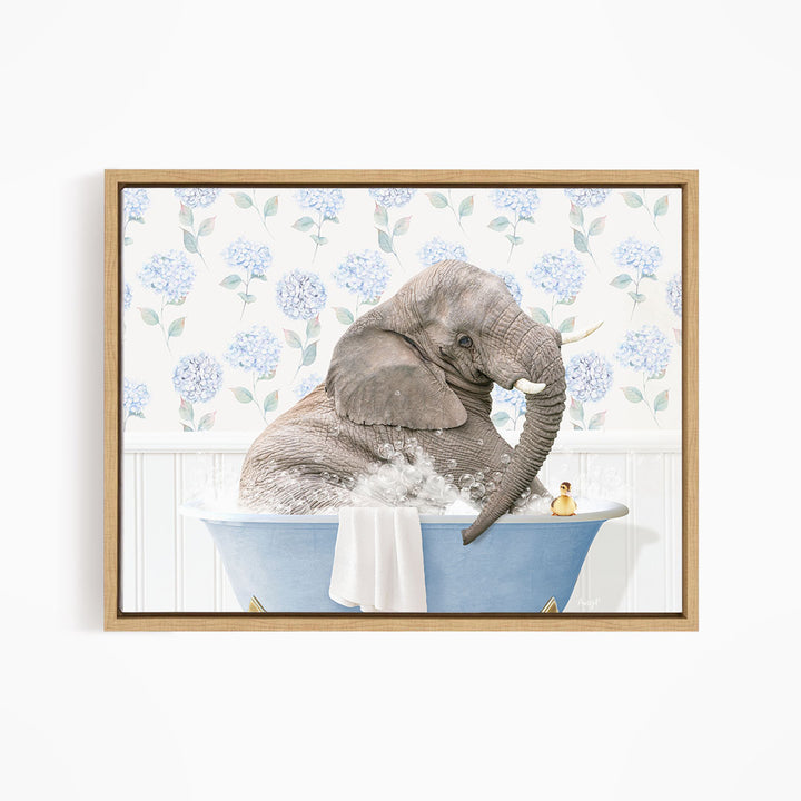 A gray elephant is sitting in a blue bathtub, surrounded by blue flowers on the wall behind it.
