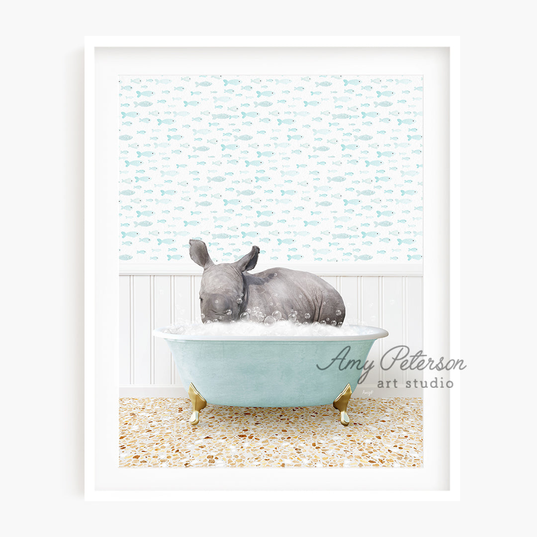 a rhino in a bathtub with a blue wall behind it