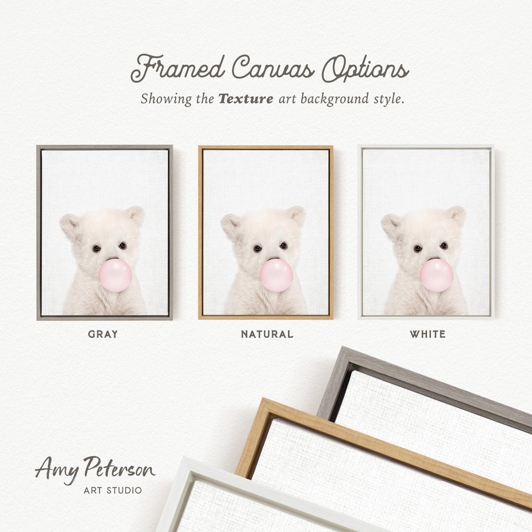 three framed canvas options, each featuring a white teddy bear blowing a bubble with a different colored bubble gum. The options are labeled as "Grays," "Natural," and "White," indicating the color of the bubble gum used.