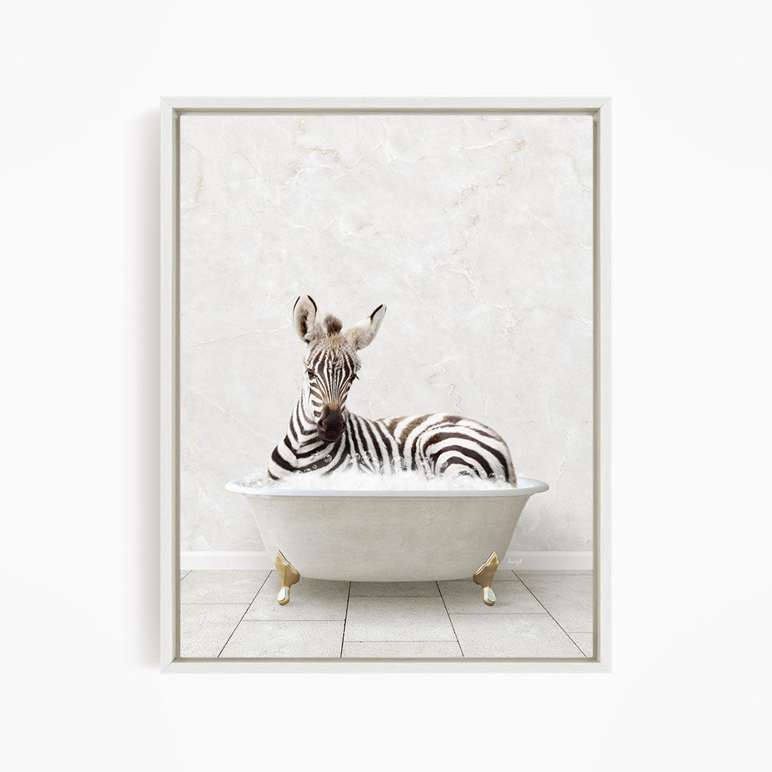 A zebra is sitting in a white bathtub, with its head resting on the edge of the tub.