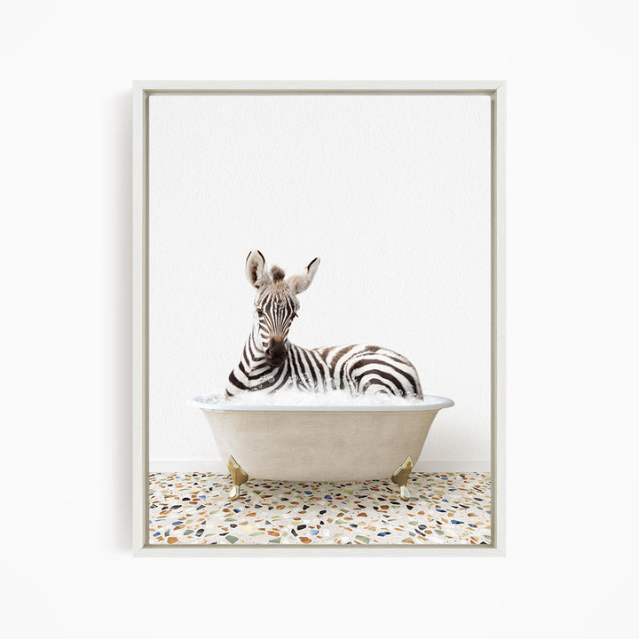 A zebra is sitting in a bathtub filled with water, creating a whimsical and playful scene.