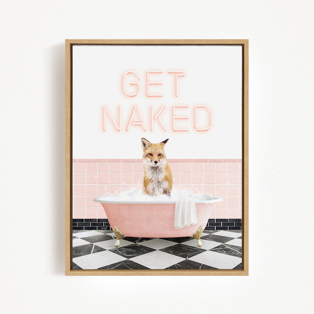 A framed image depicting a fox sitting in a pink bathtub filled with bubbles, with the text "GET NAKED" displayed above it.