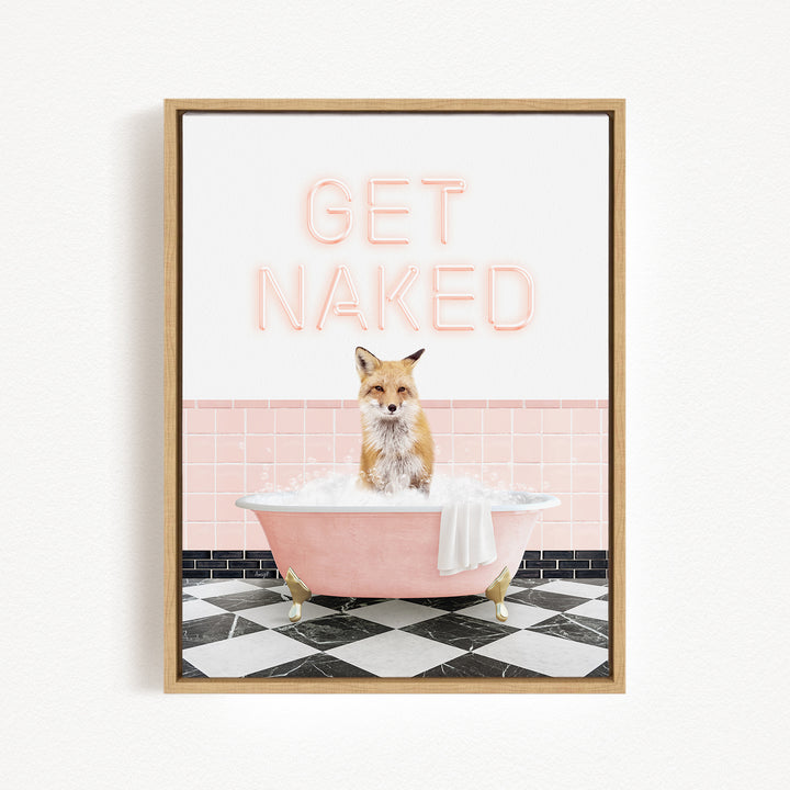 A framed image depicting a fox sitting in a pink bathtub filled with bubbles, with the text "GET NAKED" displayed above it.