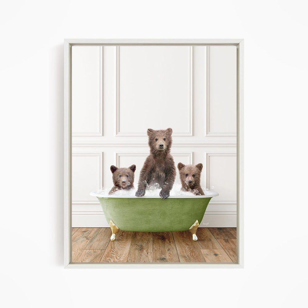A framed image of three bears sitting in a green bathtub, with one bear sitting in the center and the other two bears sitting on either side.