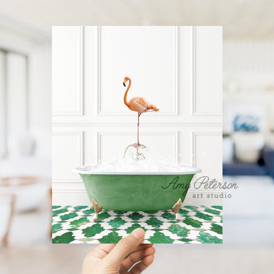 a pink flamingo standing on top of a green bath tub