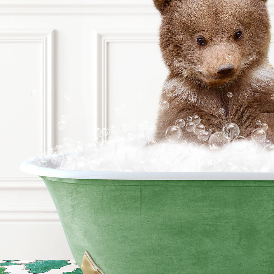 a brown bear sitting in a bath tub filled with bubbles