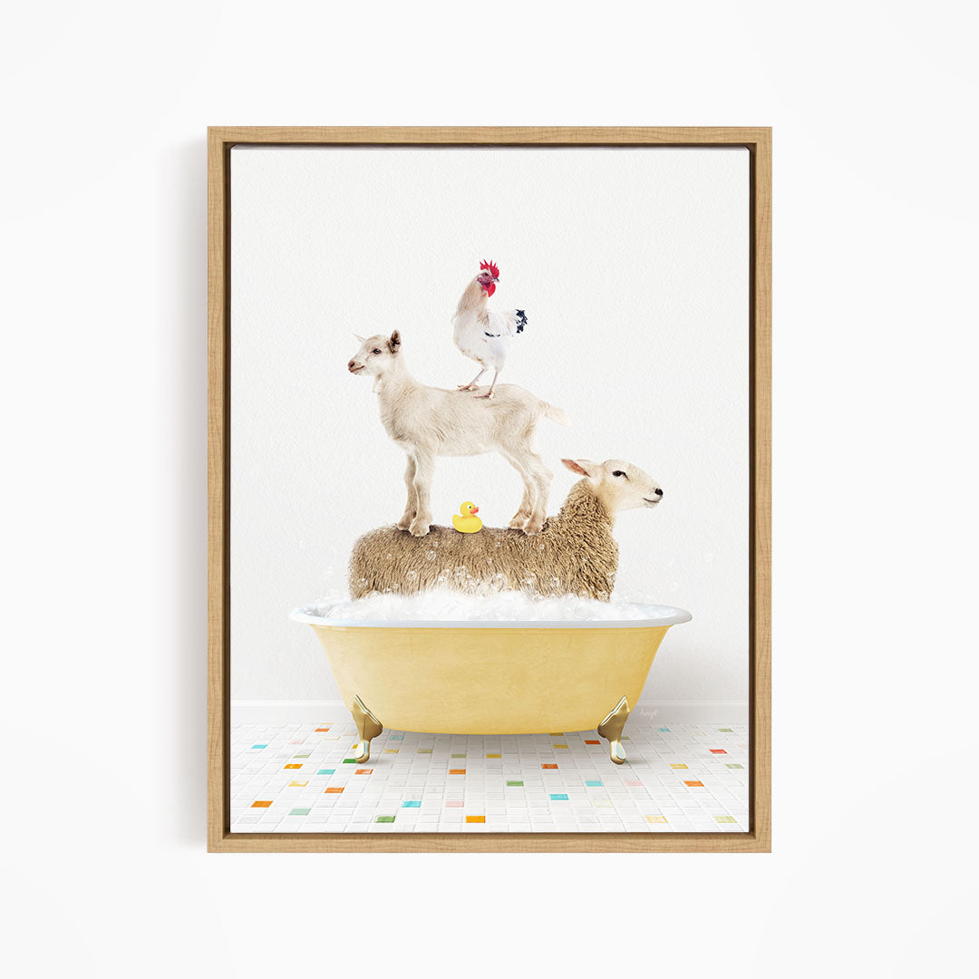 A framed image depicting a sheep standing on a tub filled with bubbles, with a chicken perched on top of the sheep and a duck sitting on the sheep's back.