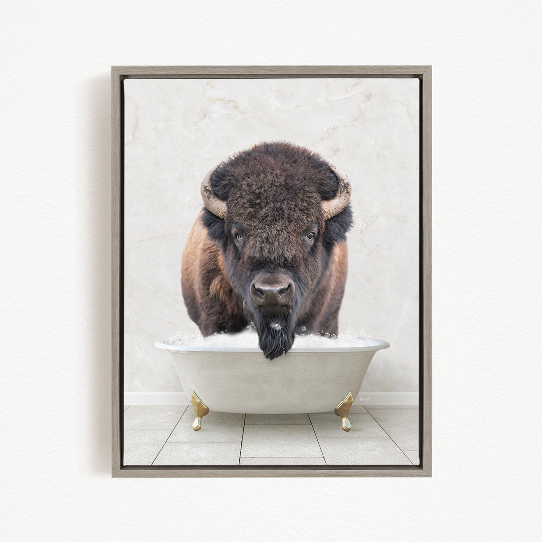 A buffalo with a long beard is sitting in a white bathtub, looking directly at the camera.