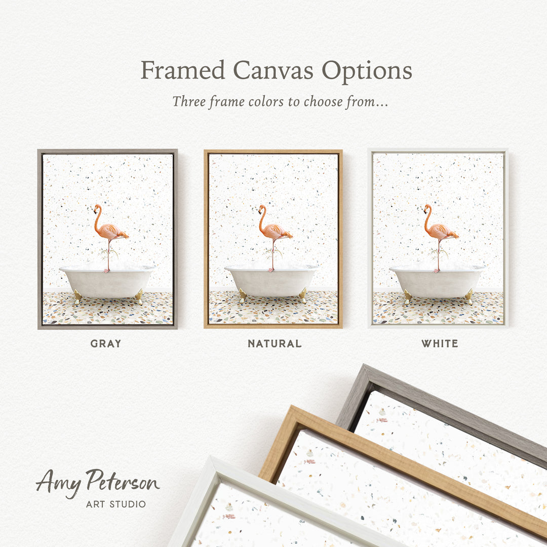 three framed canvas options featuring a flamingo in a bathtub, with three different frame colors to choose from: gray, natural, and white.