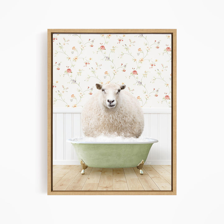 A fluffy white sheep sits in a green bathtub, surrounded by a floral wallpaper.