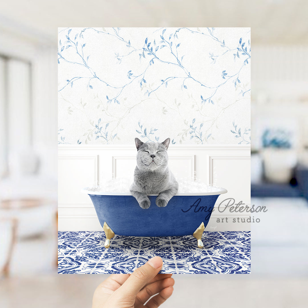 a person holding a card with a cat in a bathtub