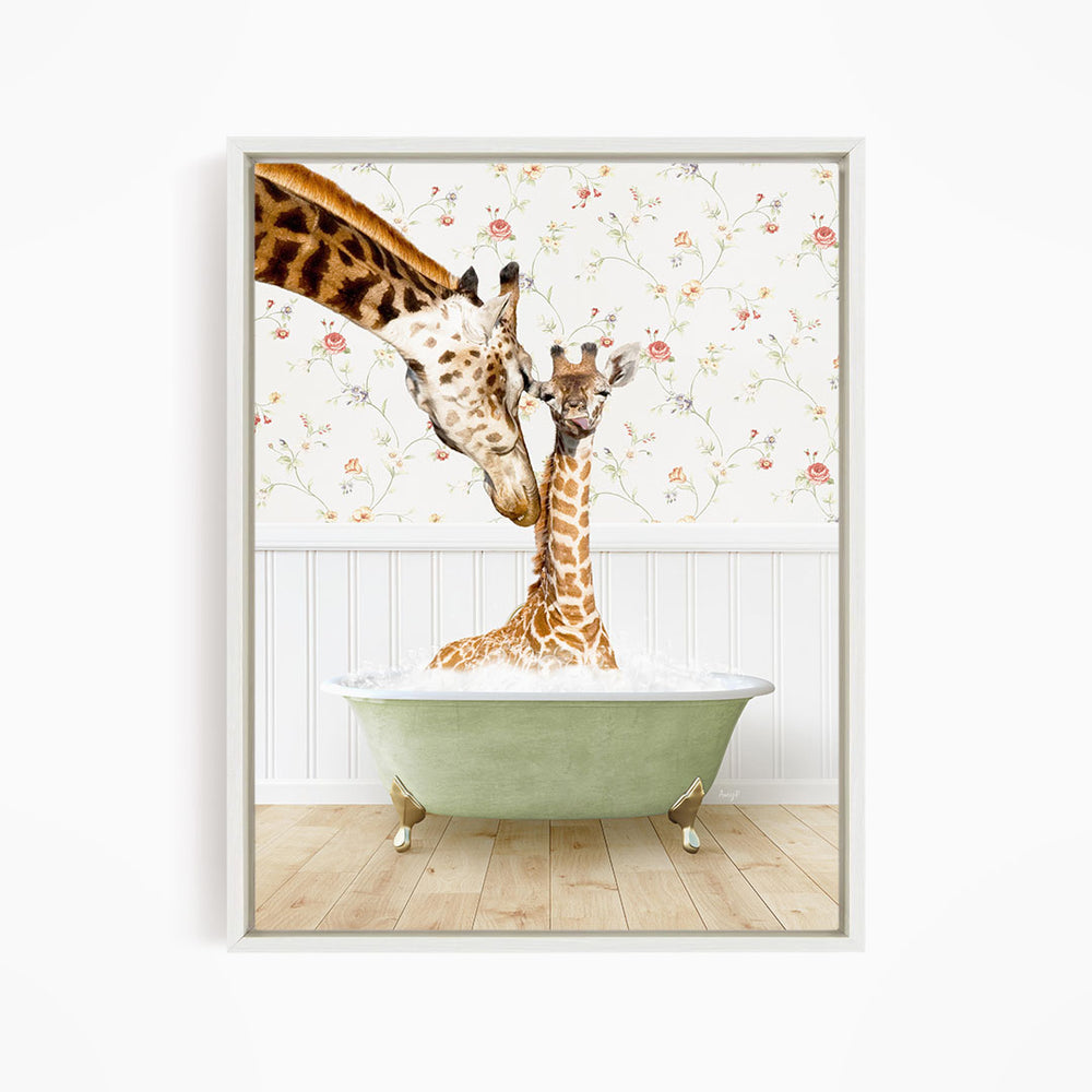 A giraffe and a baby giraffe are sitting in a green bathtub, with the baby giraffe looking at the adult giraffe.