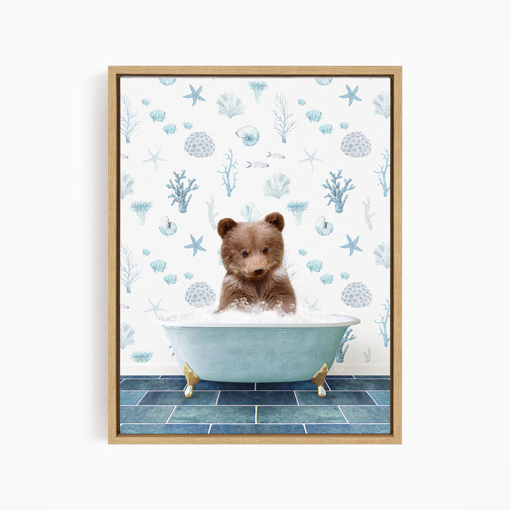 A cute brown bear sitting in a blue bathtub filled with bubbles, surrounded by a pattern of seashells, starfish, and other marine life.