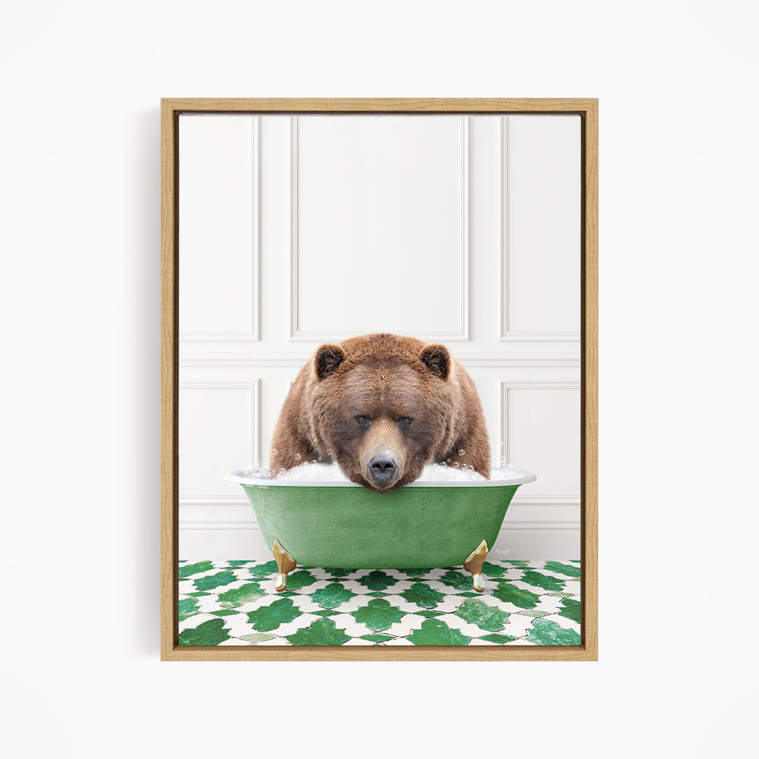 A brown bear is sitting in a green bathtub, appearing to be enjoying a bath.