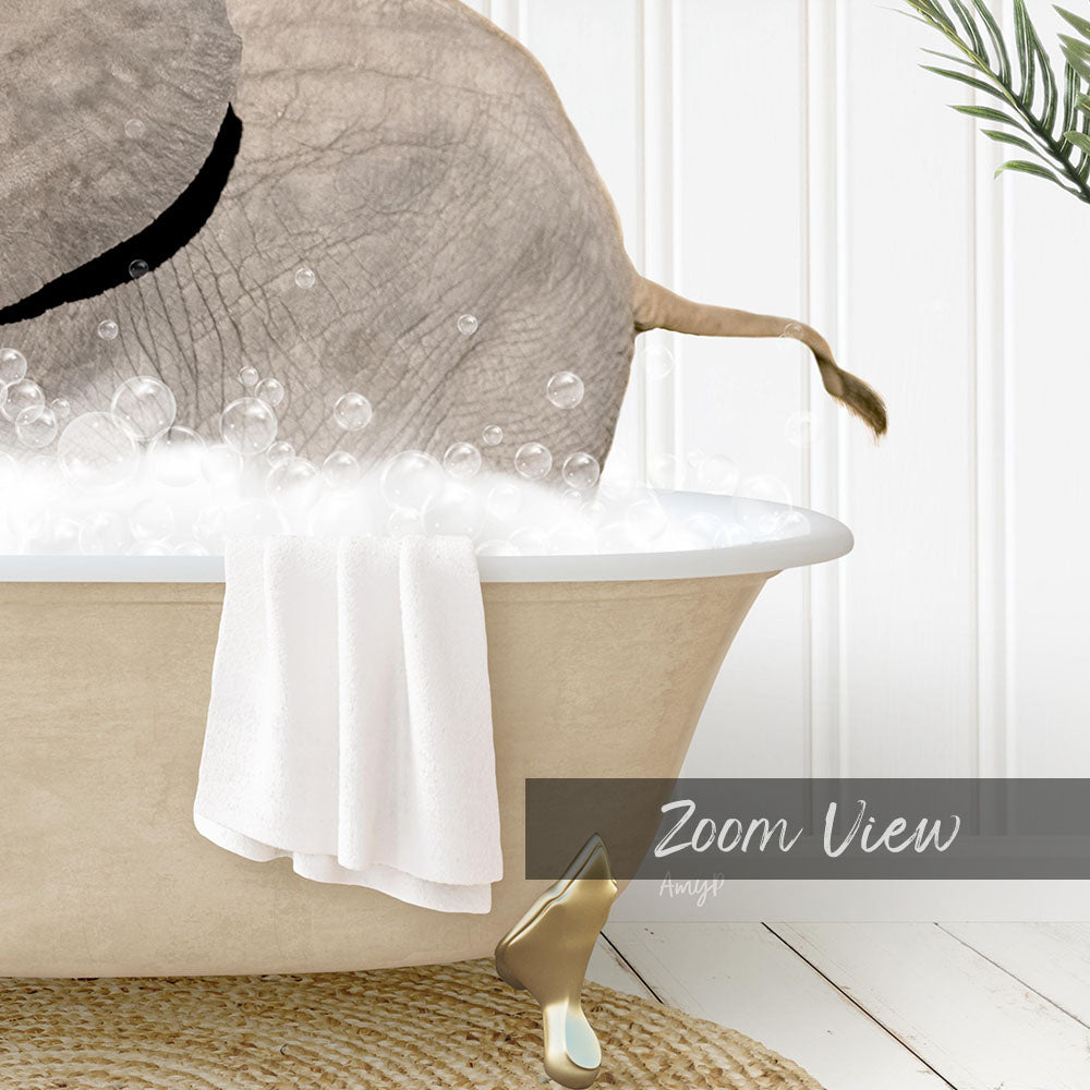 A bathtub filled with bubbles, with a towel and a gold object placed inside.